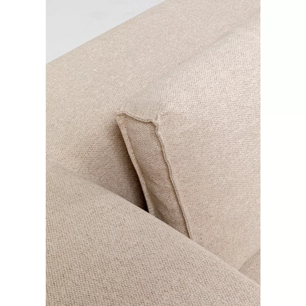 Divano angolare Infinity con poggiapiedi integrato in tessuto crema chiaro - Design moderno KARE