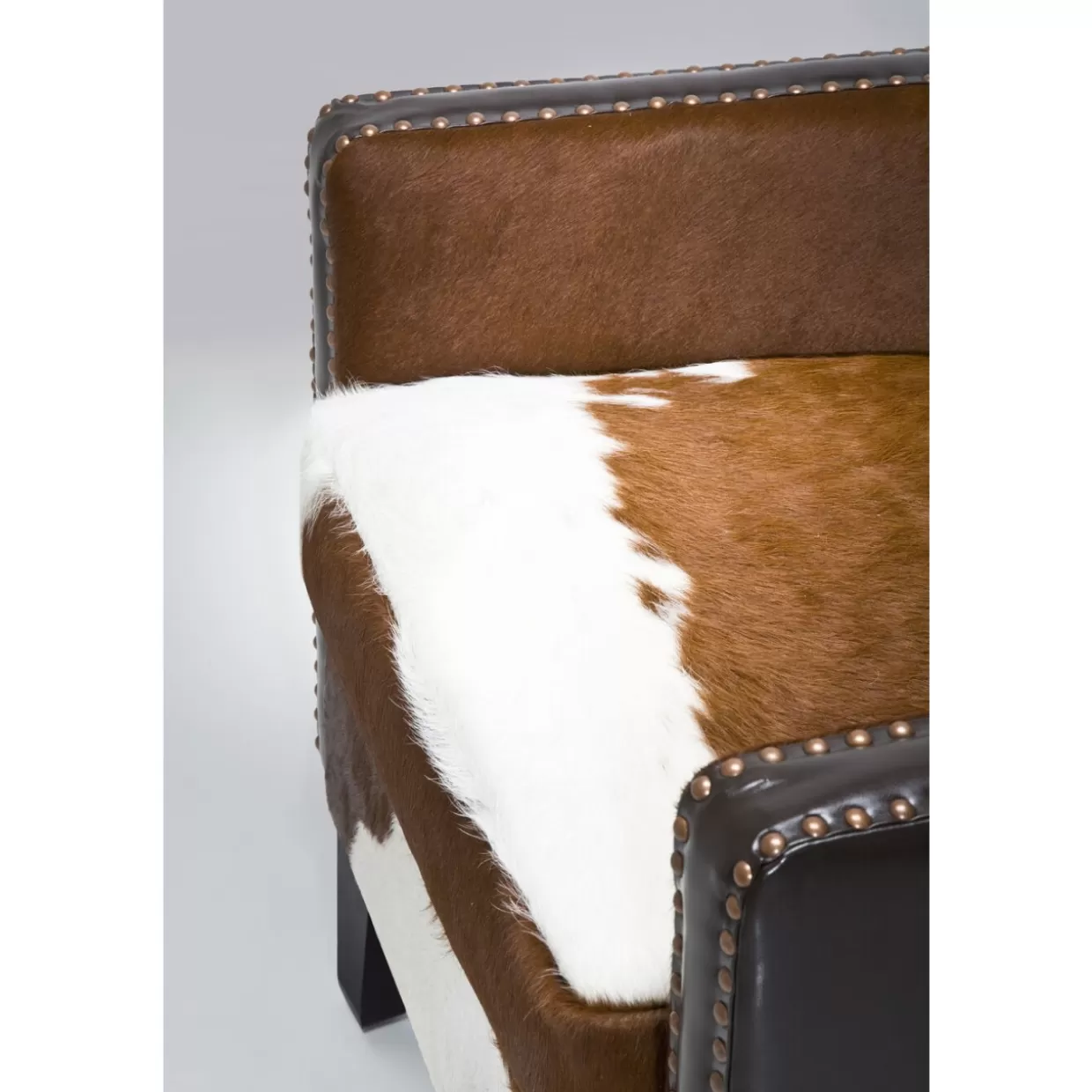 Poltrona Denver Cow Design by KARE - Sedia Comoda con Stile Western e Motivo Bovino per Arredamento Moderno